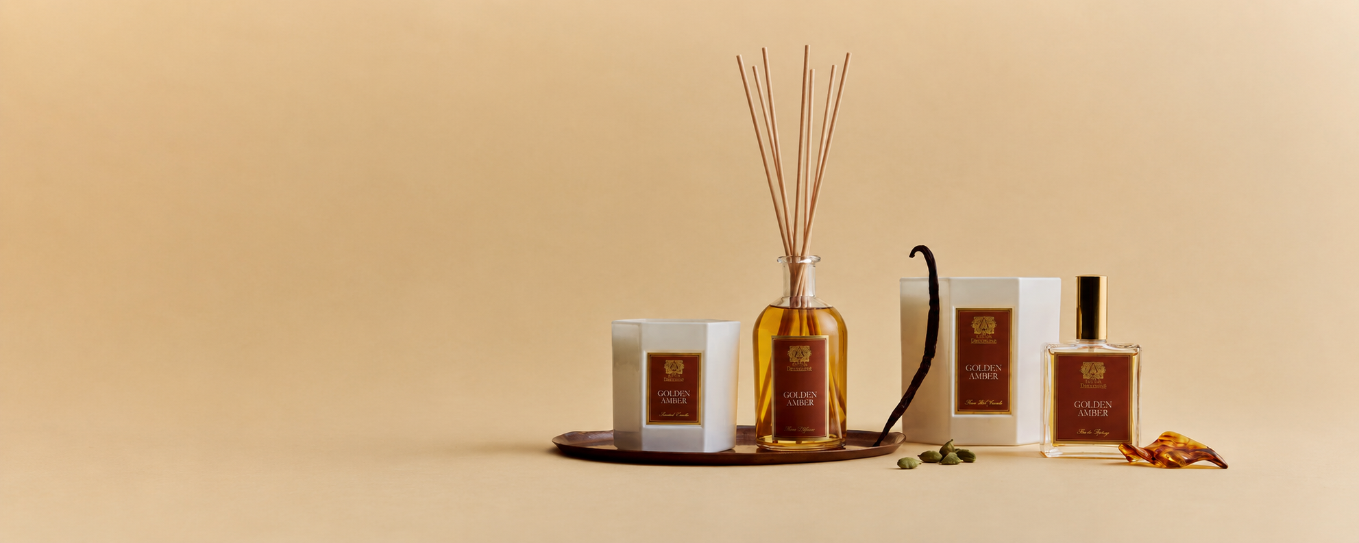 Elegant glass reed diffusers with colored oils, perfect for stylish home décor from DecoDine.