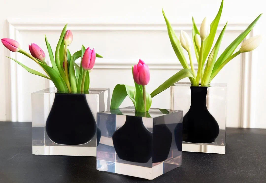 Modern acrylic vases with pink and white tulips, stylish home décor from DecoDine