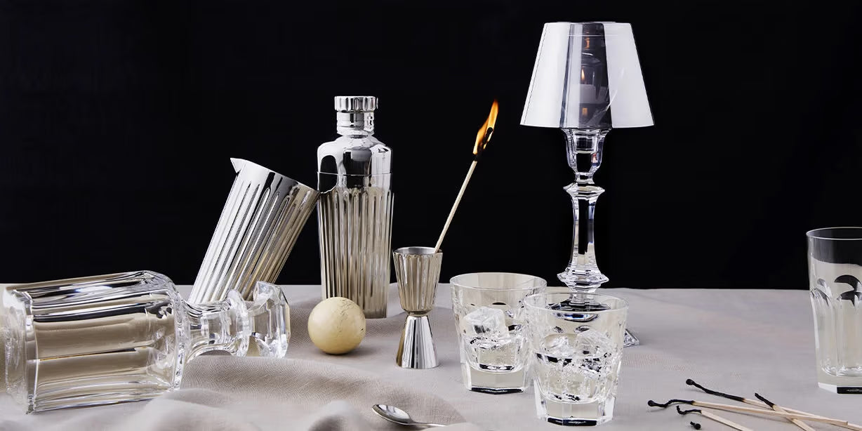 Elegant gift box with ribbon, cocktail glass, and décor on table, DecoDine home gift display